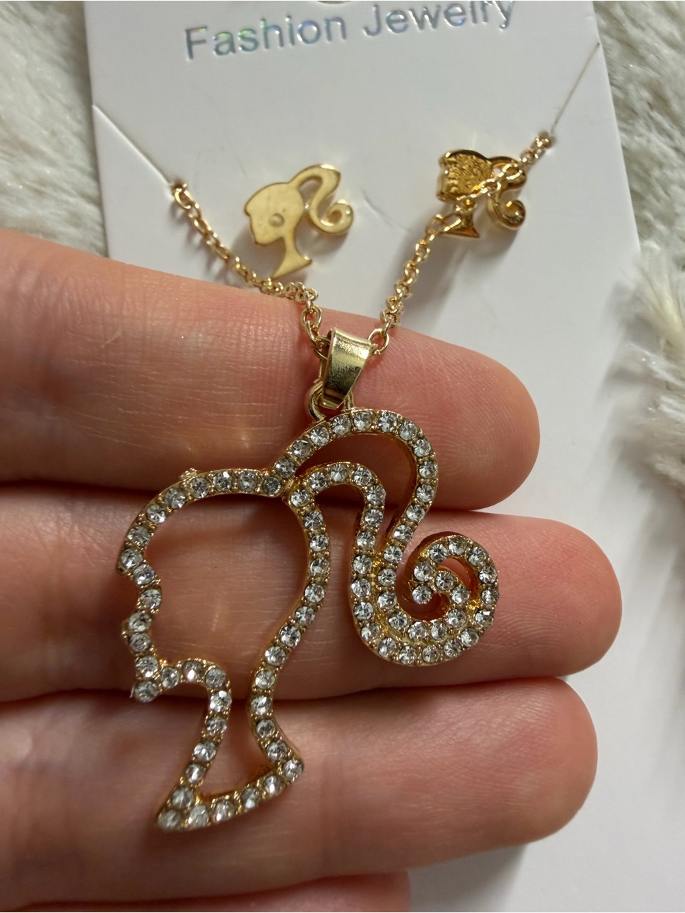 Gold-tone Crystal Silhouette Pendant Necklace and Earring Set